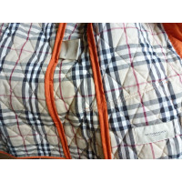 Burberry Jacke/Mantel aus Baumwolle in Orange