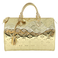 Louis Vuitton Speedy aus Lackleder in Gold