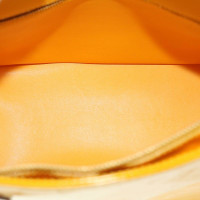 Louis Vuitton Houston aus Lackleder in Gelb