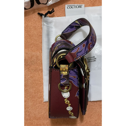 Versace Reisetasche aus Leder in Violett