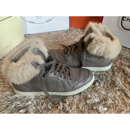 Gucci Sneakers aus Leder in Taupe