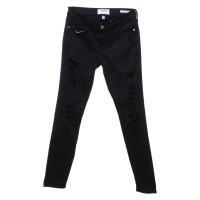 Frame Denim Skinny Jeans in black