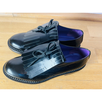 Marni Chaussures à lacets en Cuir en Noir