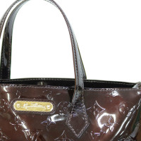 Louis Vuitton Wilshire Patent leather in Brown