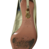 Aquazzura Sandalen aus Lackleder in Gold