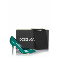 Dolce & Gabbana Pumps/Peeptoes aus Leder in Petrol