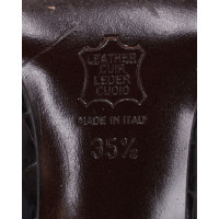 Saint Laurent Pumps/Peeptoes aus Leder in Schwarz