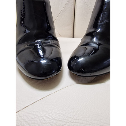 Louis Vuitton Ankle boots Patent leather in Black