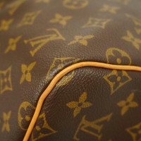 Louis Vuitton Keepall 55 Bandouliere aus Canvas in Braun