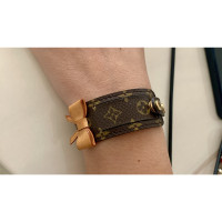 Louis Vuitton Armband Leer in Bruin