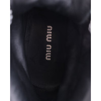 Miu Miu Stiefel aus Leder in Schwarz
