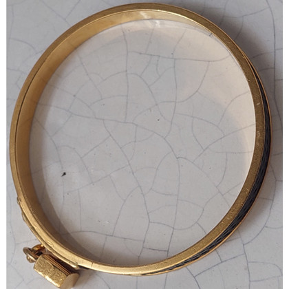 Hermès Armreif/Armband aus Leder in Gold