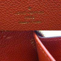 Louis Vuitton Täschchen/Portemonnaie aus Canvas in Rot