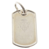Gucci pendant with logo emblem