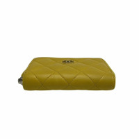 Chanel Boy Zip Around Wallet Leather in Yellow
