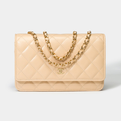 Chanel Flap Bag Leer in Goud