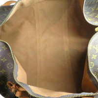 Louis Vuitton Keepall Bandouliere 60 in Tela in Marrone