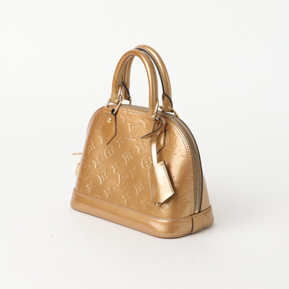 Louis Vuitton Handbag Leather in Gold