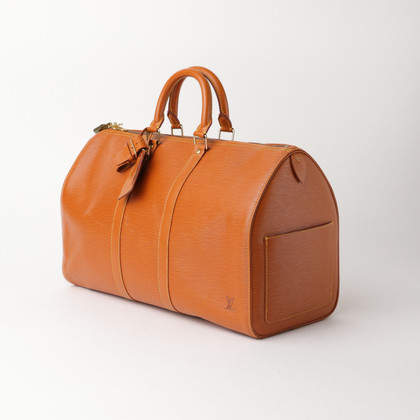 Louis Vuitton Travel bag Leather in Orange