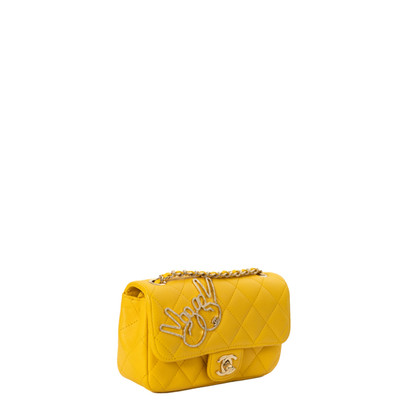 Chanel Handtasche aus Leder in Gelb