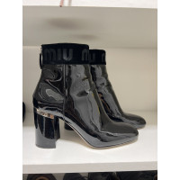 Miu Miu Ankle boots Patent leather in Black