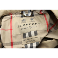 Burberry Jacke/Mantel aus Baumwolle in Gelb