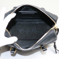 Yves Saint Laurent Baby Duffle Bag aus Leder in Schwarz