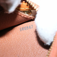 Louis Vuitton Pochette Leather in Brown