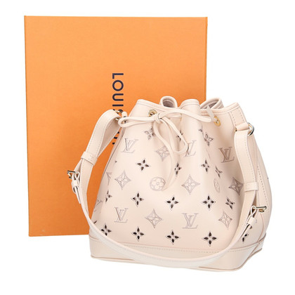 Louis Vuitton Handbag Leather in Beige