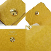 Hermès Clutch aus Leder in Gelb