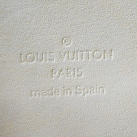 Louis Vuitton Houston Lakleer in Geel