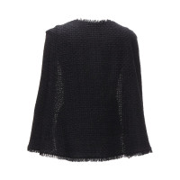 Chanel Jacke/Mantel aus Wolle in Schwarz