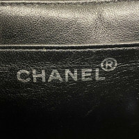 Chanel Matelassée en Cuir verni en Noir