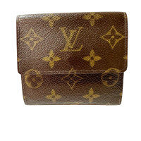 Louis Vuitton Lockme Portemonnaie aus Canvas in Braun