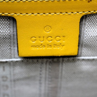 Gucci Clutch aus Leder in Gelb