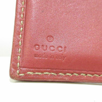 Gucci Täschchen/Portemonnaie aus Leder in Fuchsia
