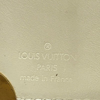 Louis Vuitton Täschchen/Portemonnaie aus Leder in Gold