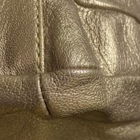 Salvatore Ferragamo Vara Leather in Gold