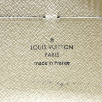 Louis Vuitton Sac à main/Portefeuille en Toile en Doré