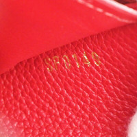 Louis Vuitton Victorine Wallet aus Leder in Rot