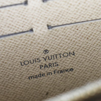 Louis Vuitton Täschchen/Portemonnaie aus Canvas in Gold