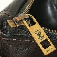 Louis Vuitton Lockme Portemonnaie aus Leder in Schwarz