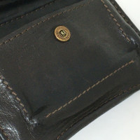 Louis Vuitton Lockme Portemonnaie aus Leder in Schwarz