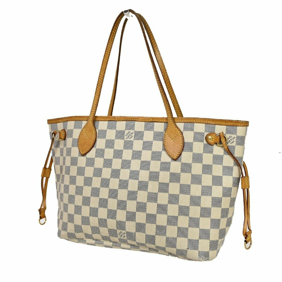 Louis Vuitton Neverfull Canvas in Gold