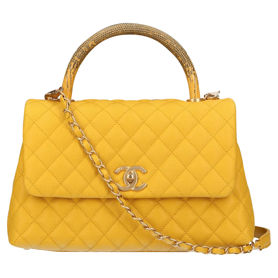 Chanel "Top Handle Flap Bag"