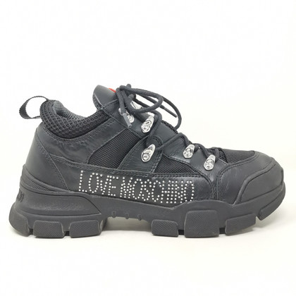Love Moschino Sneakers aus Leder in Schwarz