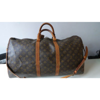 Louis Vuitton Keepall 55 Bandouliere in brown canvas