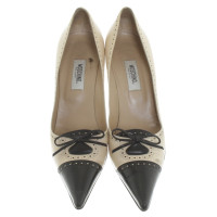 Moschino pumps con Lyra perforazione