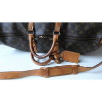 Louis Vuitton Keepall 55 Bandouliere in brown canvas