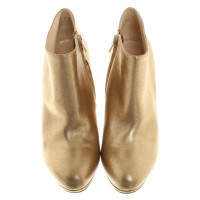Christian Louboutin Gold-colored boots